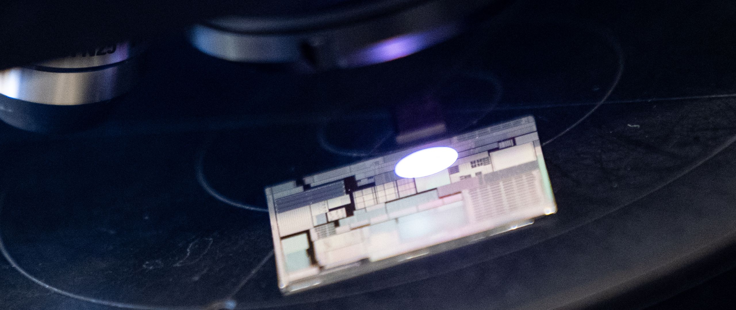 A chip under a scanner at the Center for Heterogeneous and Performance Scaling laboratory